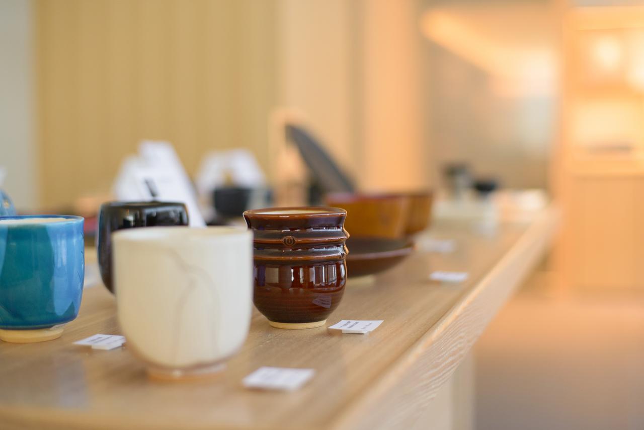 فندق كانازاوا طوكيو كانازاوَ المظهر الخارجي الصورة A small collection of the many objects that can be used for a game of goban